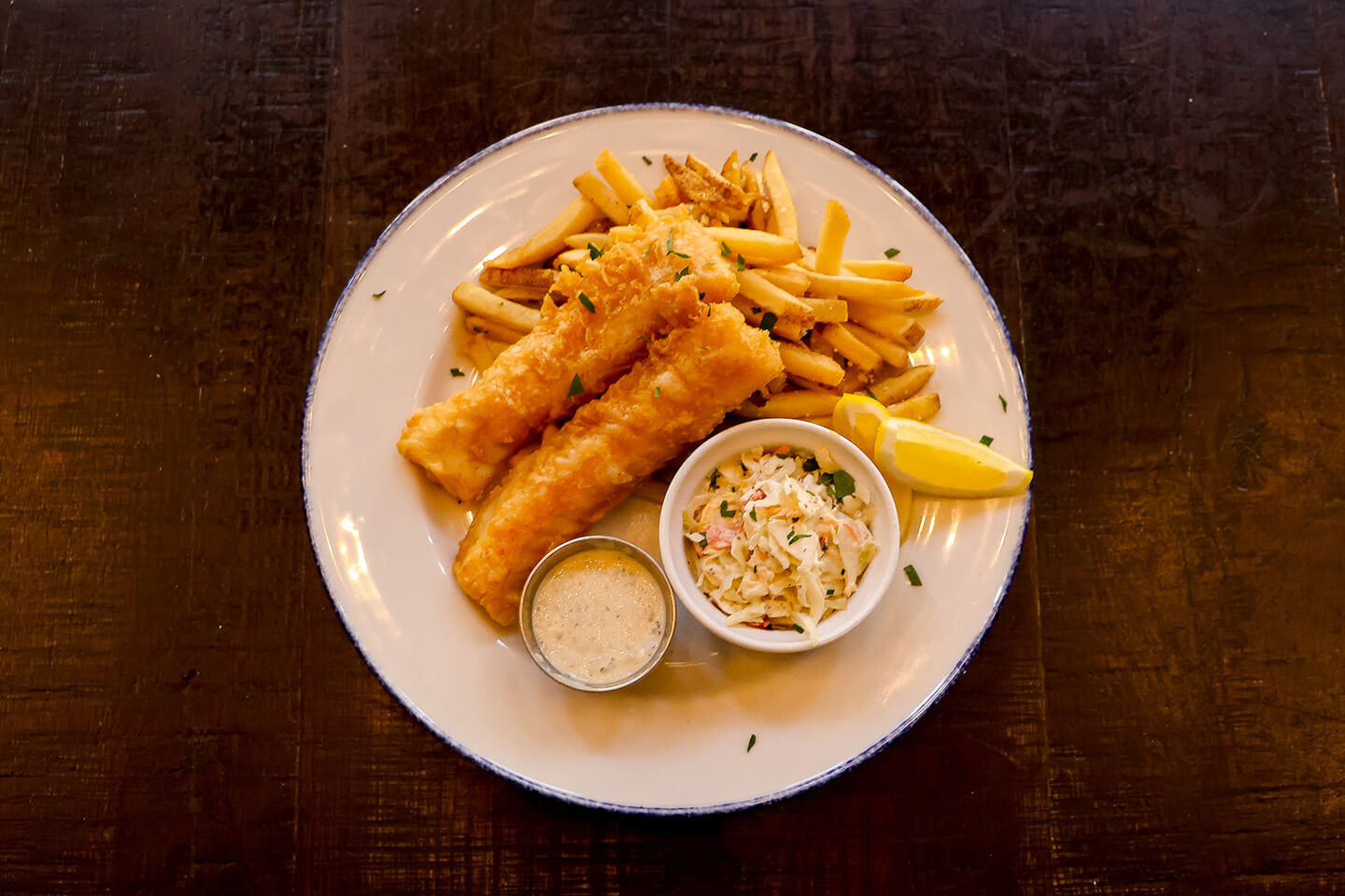 plate of beer battered fish and chips from tangled roots craft beer and kitchen