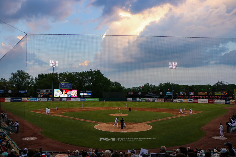 kane county cougars baseball game being played at sunset